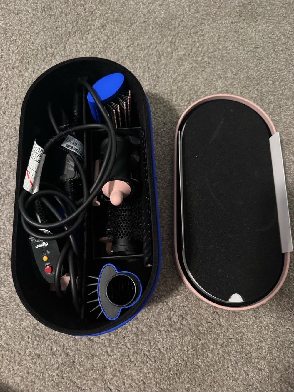 Almost New Dyson styling kit with blue and pink accents with 7 attachments